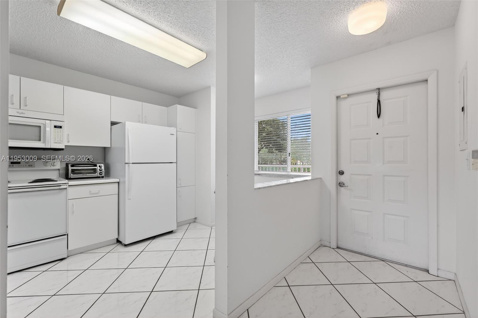 9525 Weldon Circle, Unit H205 Tamarac, FL 33321 - Photo 3 of 34