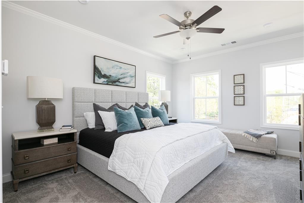 1009 Taylor Court Acworth, GA 30102 - Photo 20 of 30 a bedroom with a bed and a window