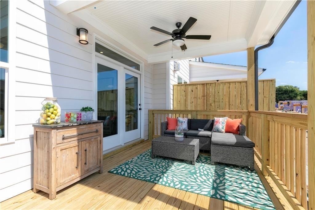 1009 Taylor Court Acworth, GA 30102 - Photo 29 of 30 a living room with furniture and a rug