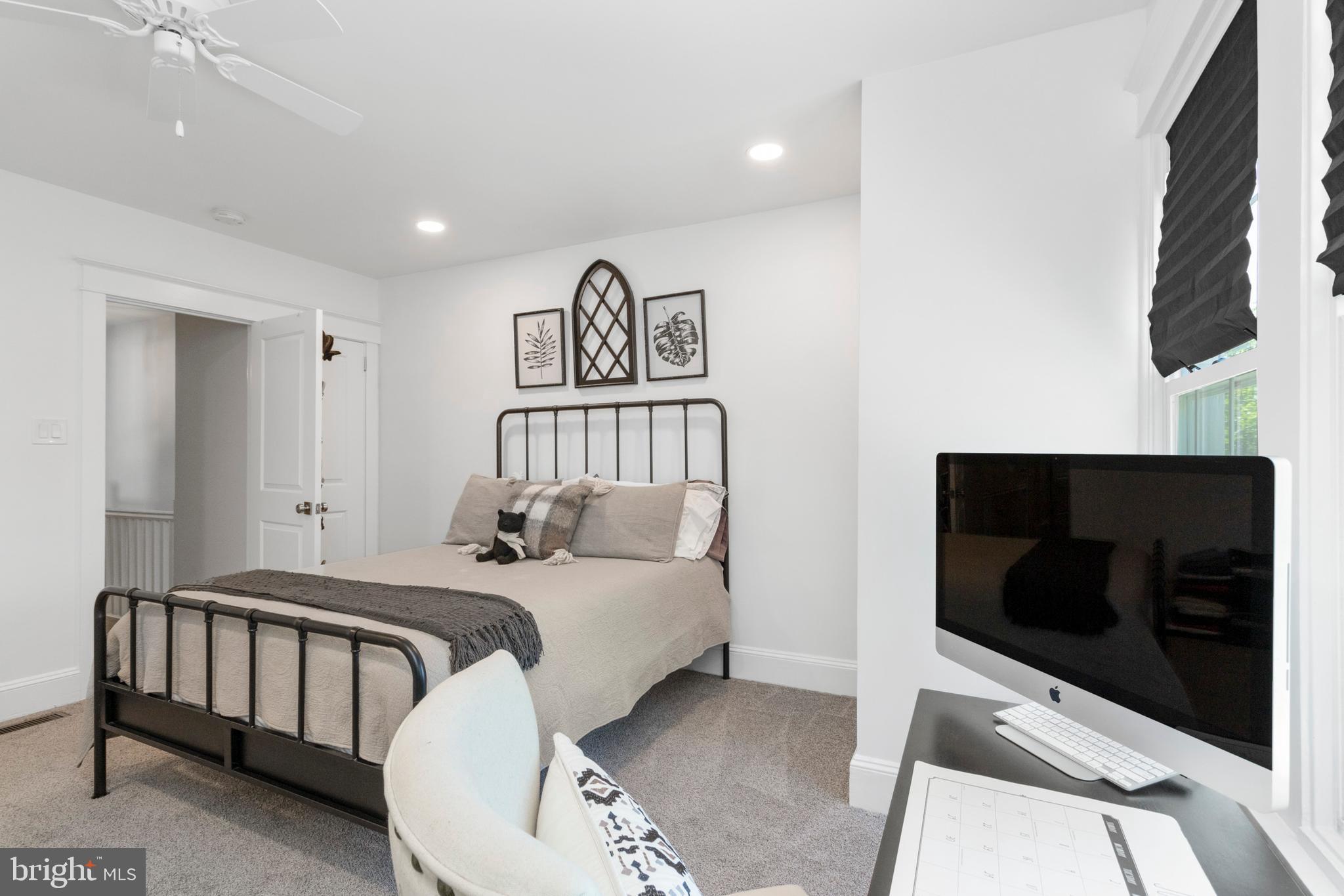 528 Lower E Valley Forge Road King of Prussia, PA 19406 - Photo 19 of 40 a bedroom with a bed and a television