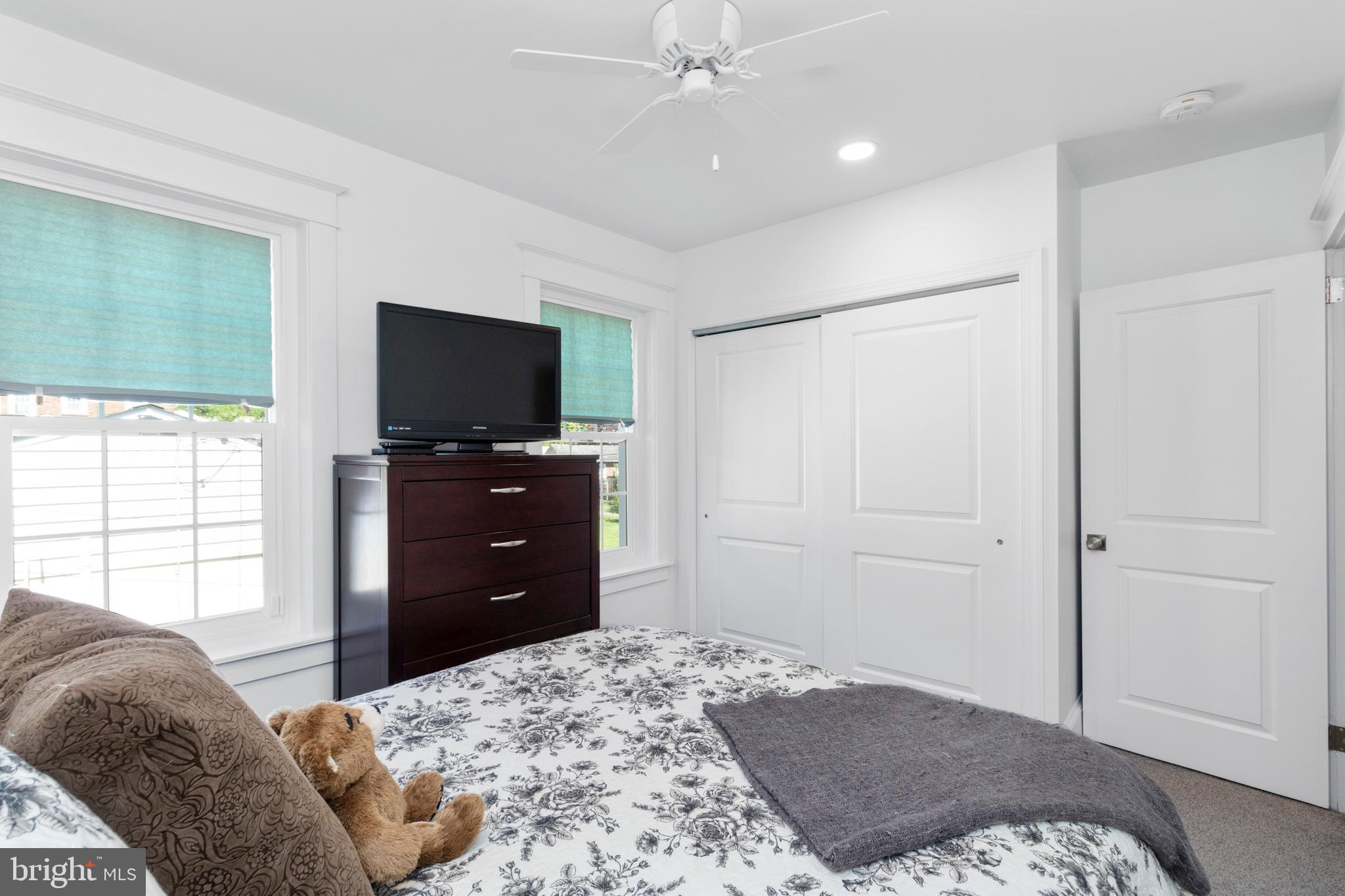 528 Lower E Valley Forge Road King of Prussia, PA 19406 - Photo 25 of 40 a bedroom with a bed and a television