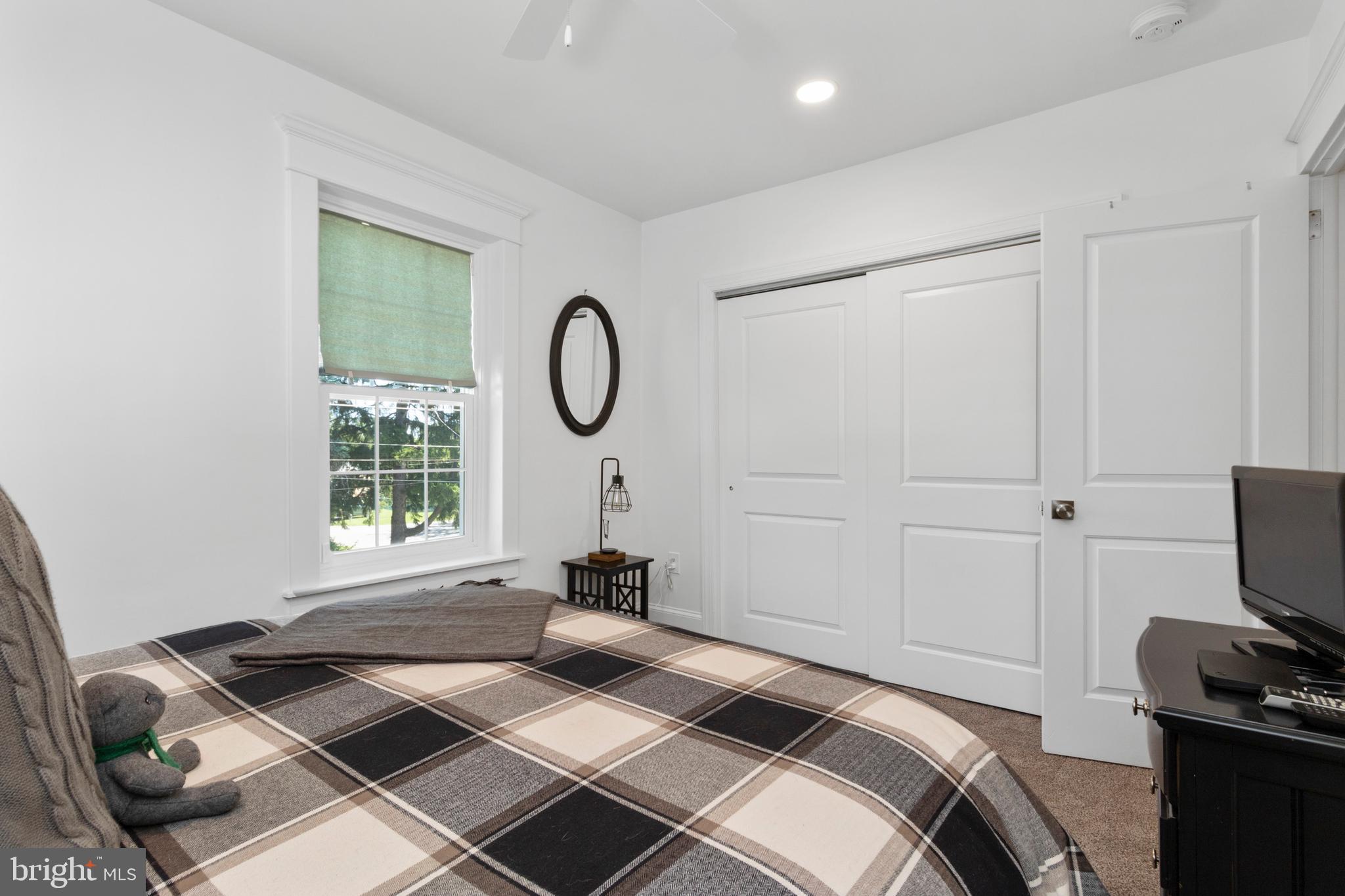 528 Lower E Valley Forge Road King of Prussia, PA 19406 - Photo 29 of 40 a bedroom with a bed and a window