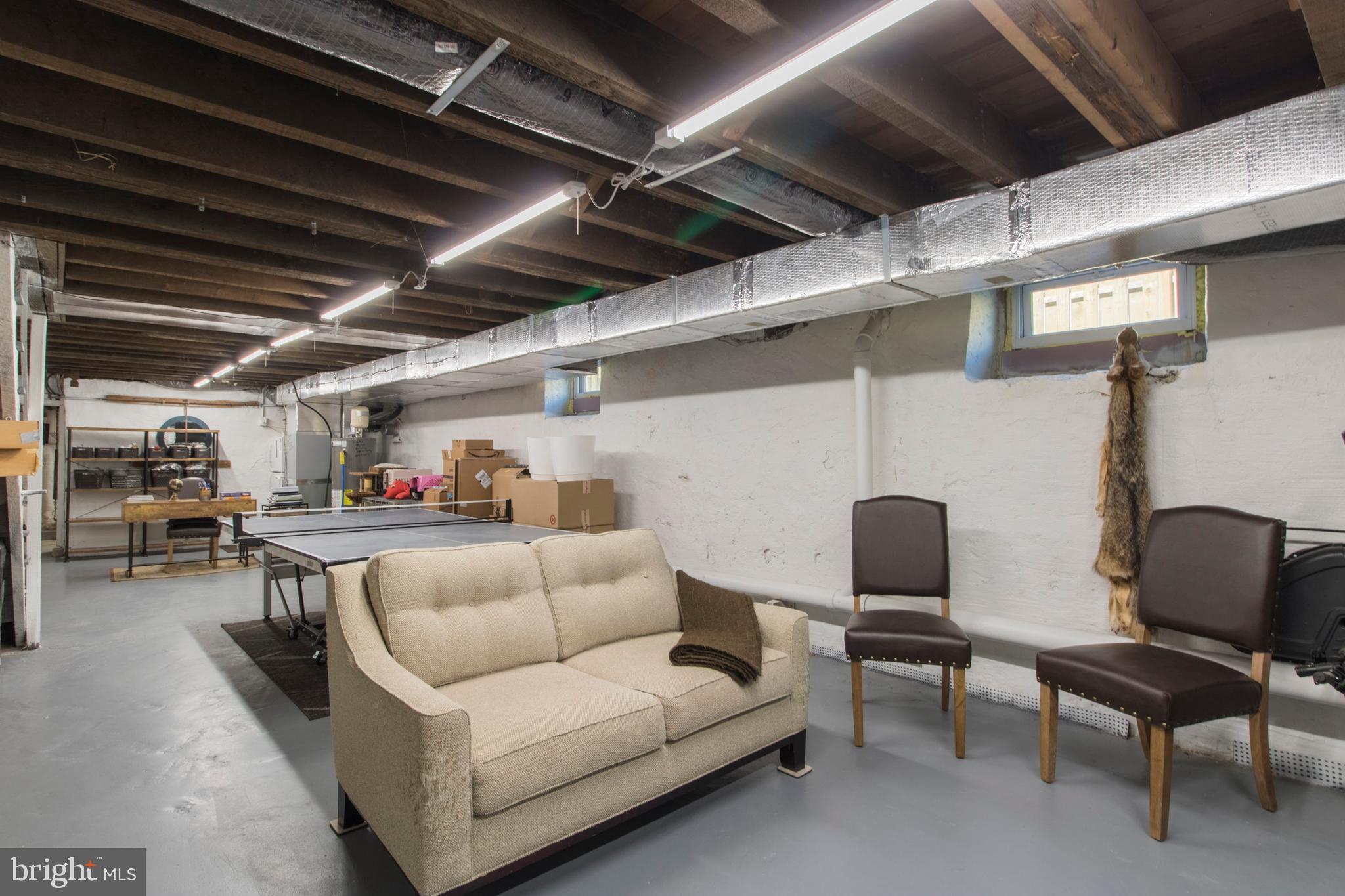 528 Lower E Valley Forge Road King of Prussia, PA 19406 - Photo 32 of 40 a view of livingroom with furniture and a couch