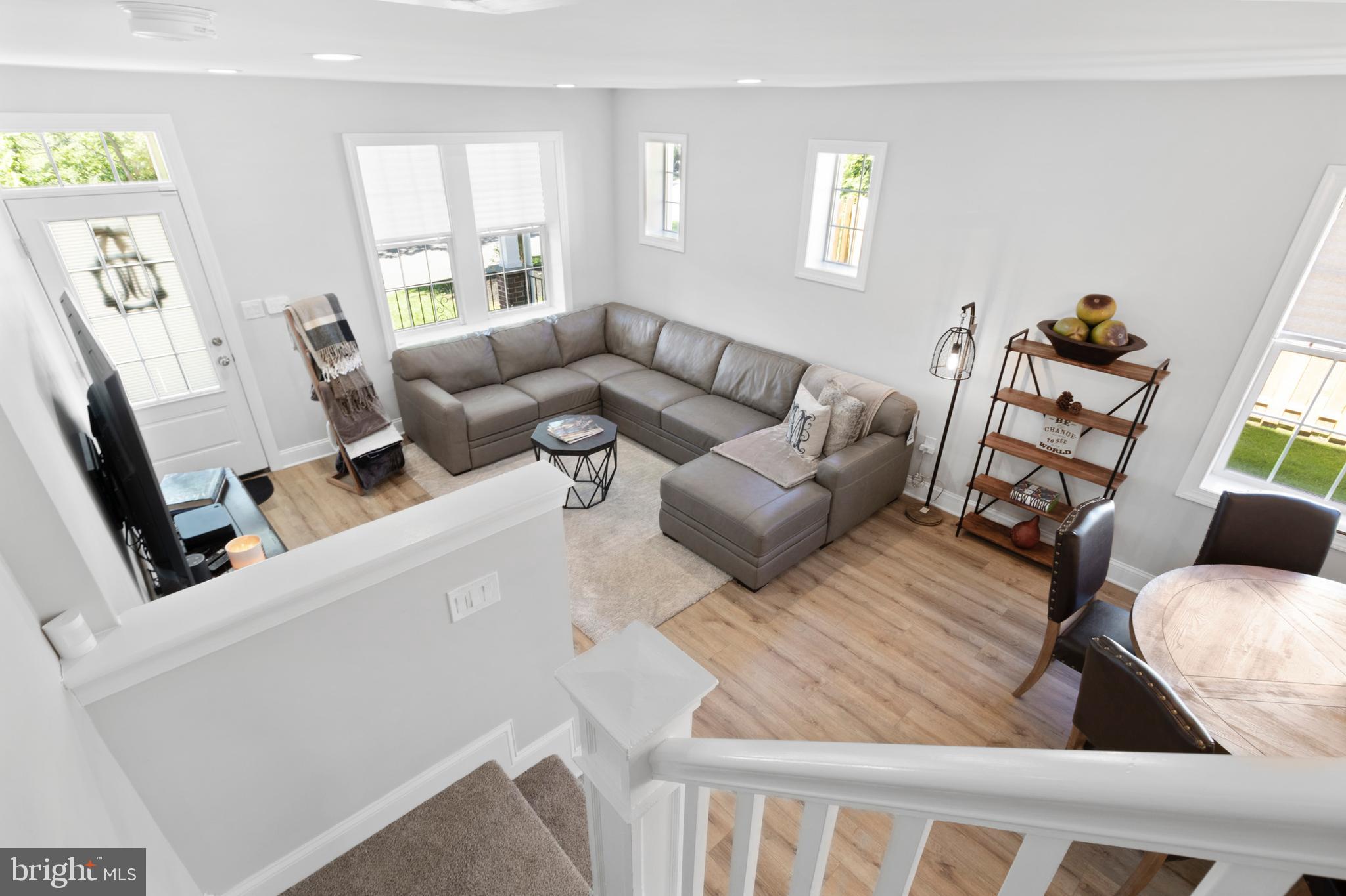 528 Lower E Valley Forge Road King of Prussia, PA 19406 - Photo 6 of 40 a living room with furniture and a flat screen tv
