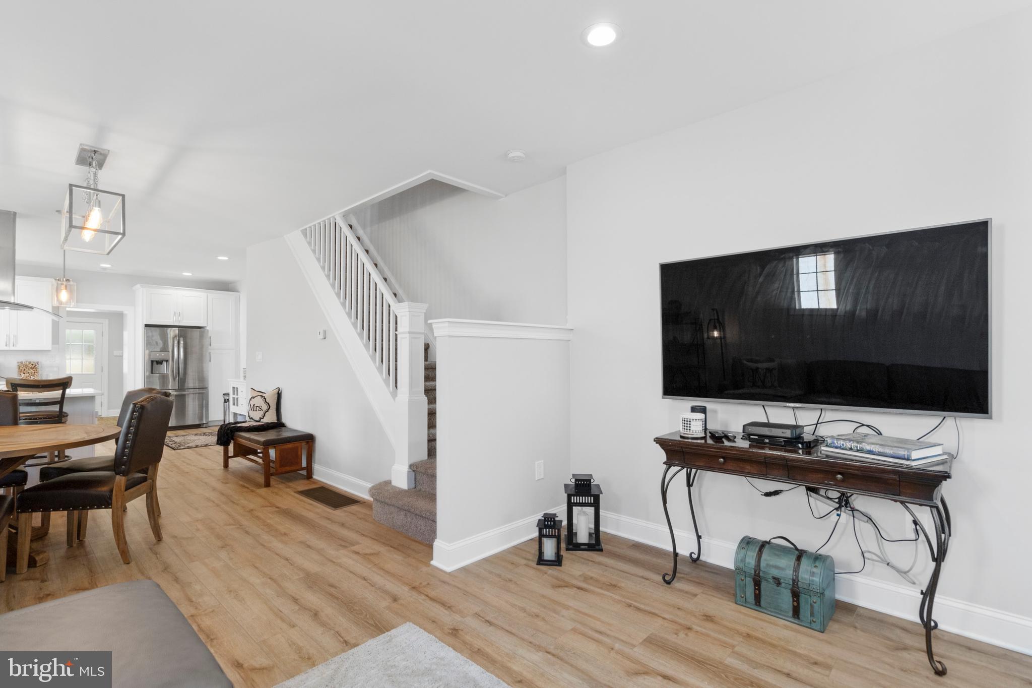 528 Lower E Valley Forge Road King of Prussia, PA 19406 - Photo 7 of 40 a workspace with furniture and wooden floor