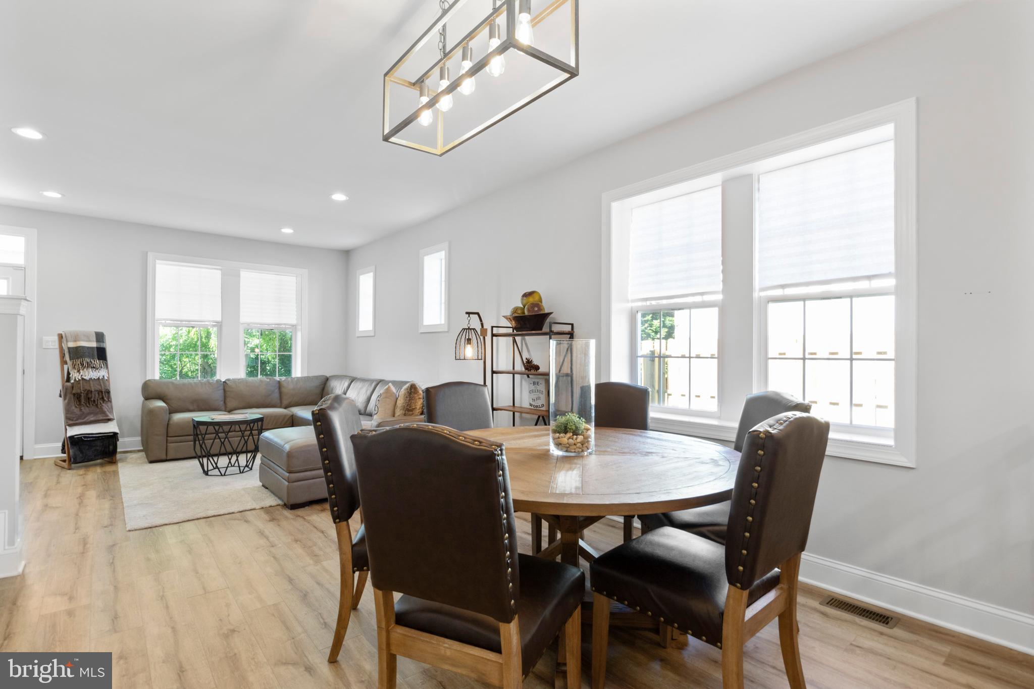 528 Lower E Valley Forge Road King of Prussia, PA 19406 - Photo 10 of 40 a view of a dining room with furniture window and wooden floor