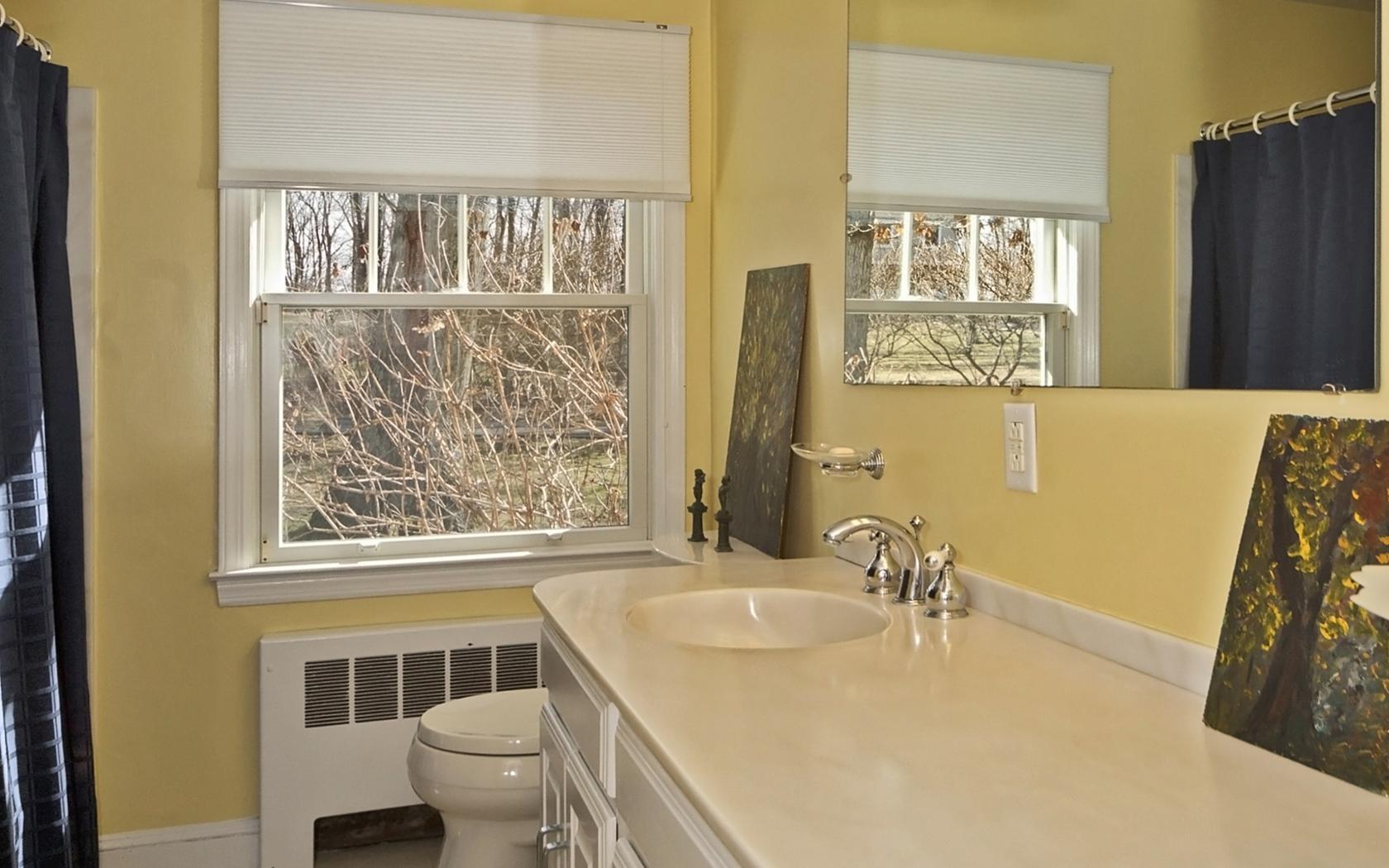25 Timber Top Trail Wilton, CT 06897 - Photo 12 of 25 a bathroom with a sink toilet and shower