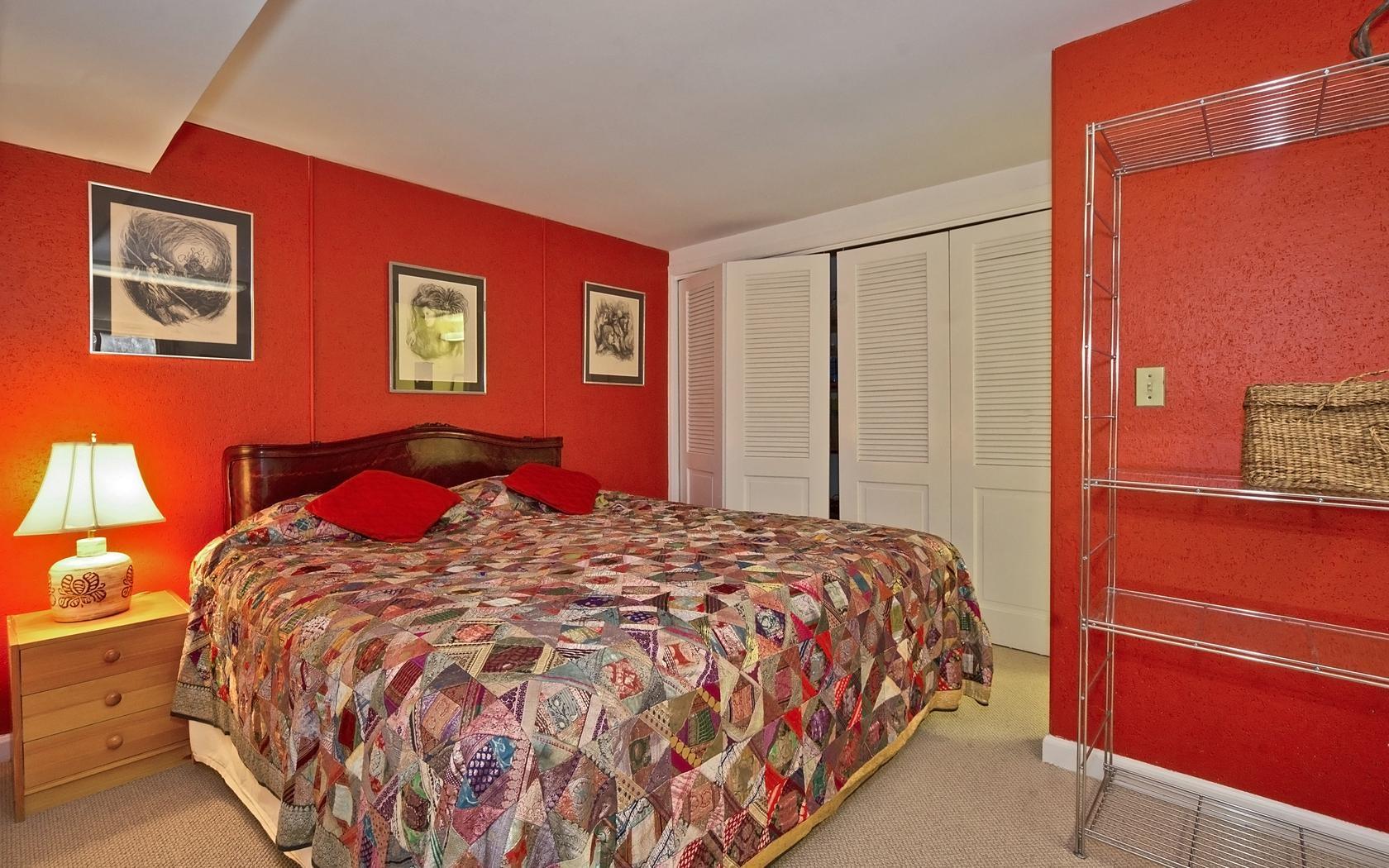 25 Timber Top Trail Wilton, CT 06897 - Photo 14 of 25 a bedroom with a bed and wooden floor