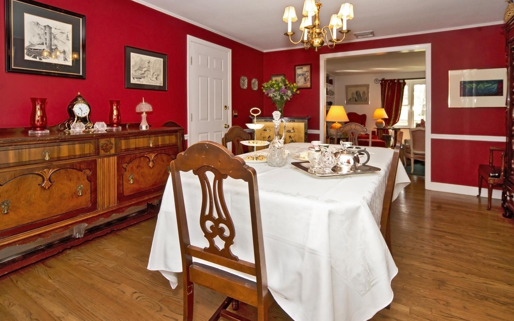 25 Timber Top Trail Wilton, CT 06897 - Photo 6 of 25 a dining room with wooden floor a chandelier a wooden table and chairs