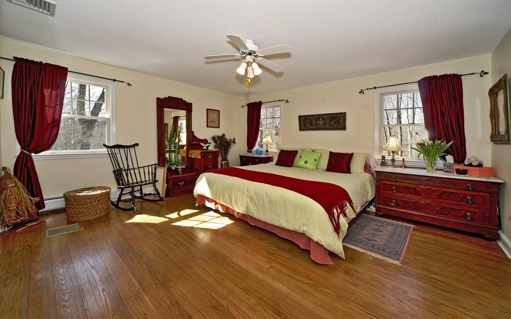 25 Timber Top Trail Wilton, CT 06897 - Photo 9 of 25 a bed room with a bed and a window