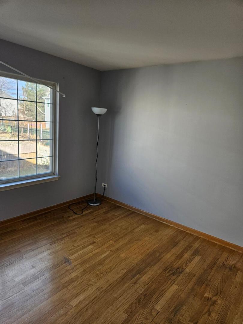 10 Ronan Court, Unit 10 Lake In The Hills, IL 60156 - Photo 11 of 20 a view of an empty room and window