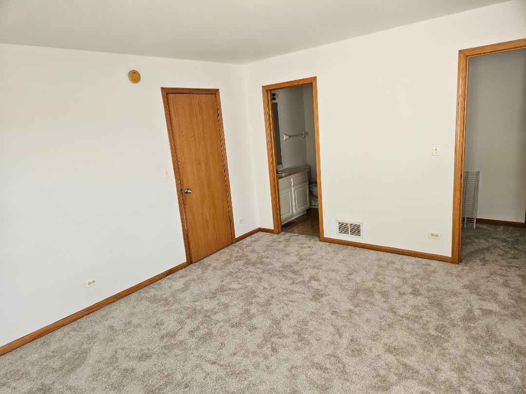 10 Ronan Court, Unit 10 Lake In The Hills, IL 60156 - Photo 13 of 20 a view of an empty room