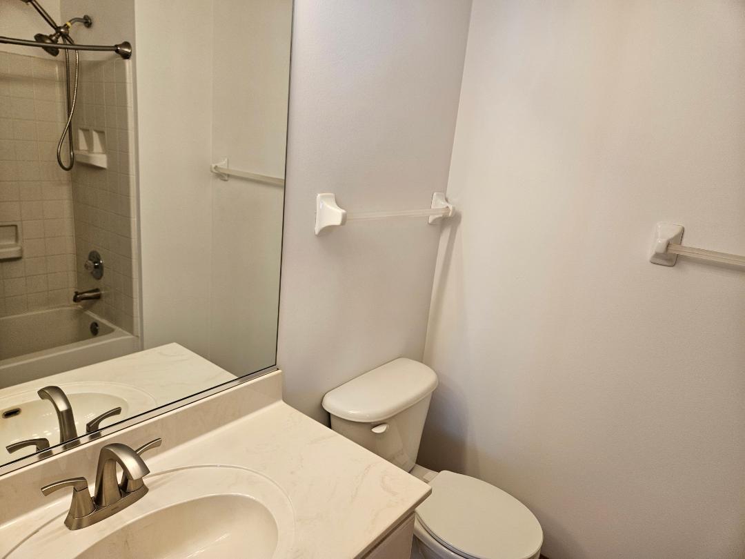 10 Ronan Court, Unit 10 Lake In The Hills, IL 60156 - Photo 15 of 20 a bathroom with a sink toilet and shower