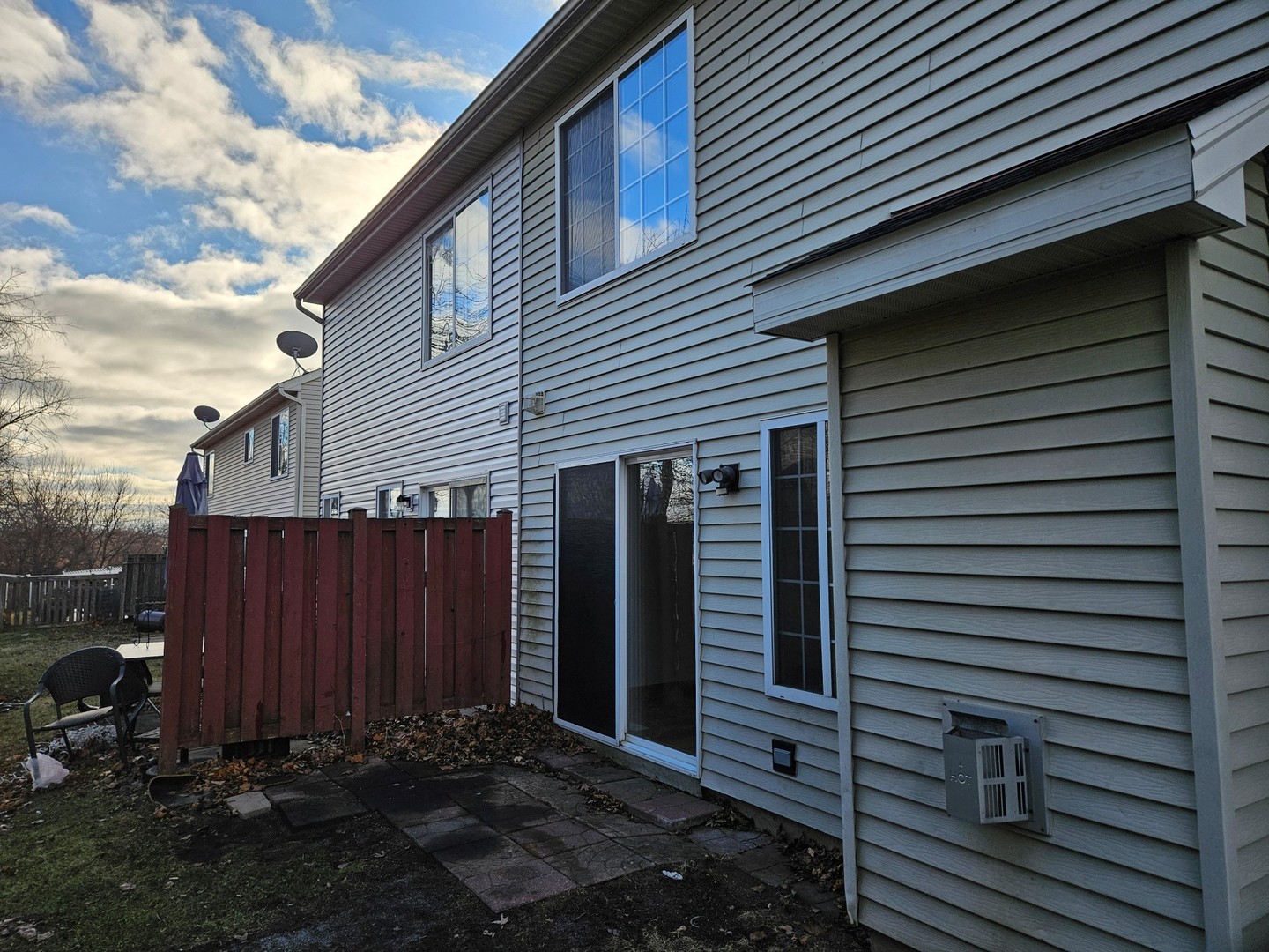 10 Ronan Court, Unit 10 Lake In The Hills, IL 60156 - Photo 20 of 20 a view of a house with backyard and a trees