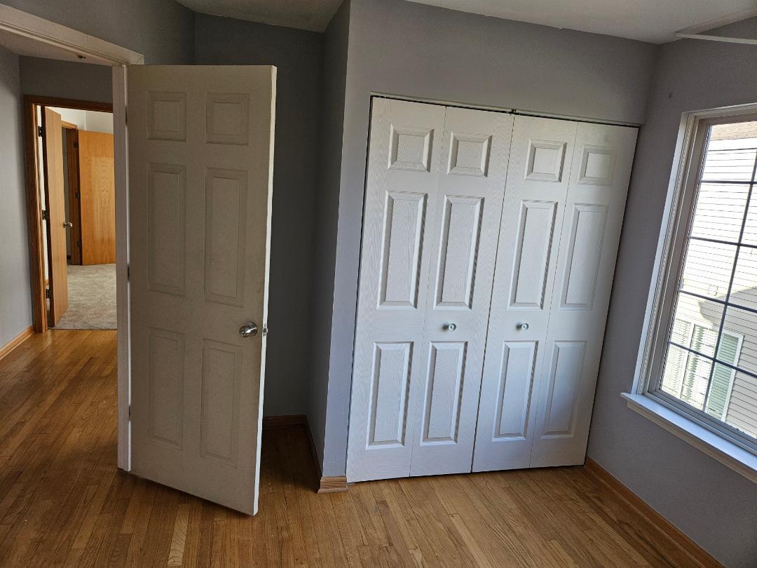 10 Ronan Court, Unit 10 Lake In The Hills, IL 60156 - Photo 8 of 20 a view of front door with wooden floor