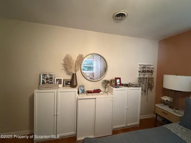 a close view of a utility room with washer and dryer