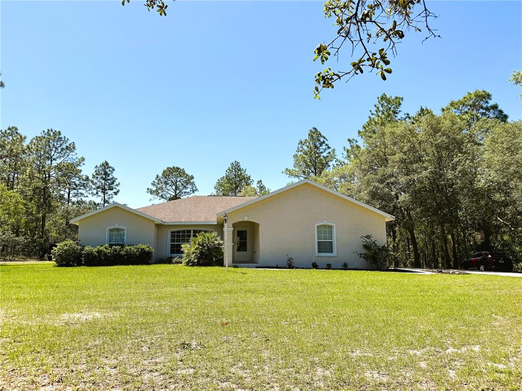 7134 Southwest 129th Terrace Road Ocala, FL 34481 - Photo 1 of 1 MAIN FT VIEW OFF 100 FOOT ROAD