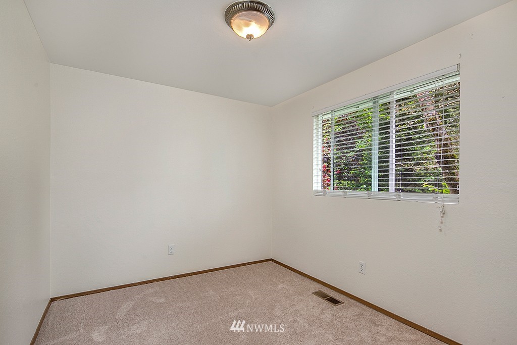 623 Harvest Road Bothell, WA 98012 - Photo 5 of 11 a view of a livingroom with a window