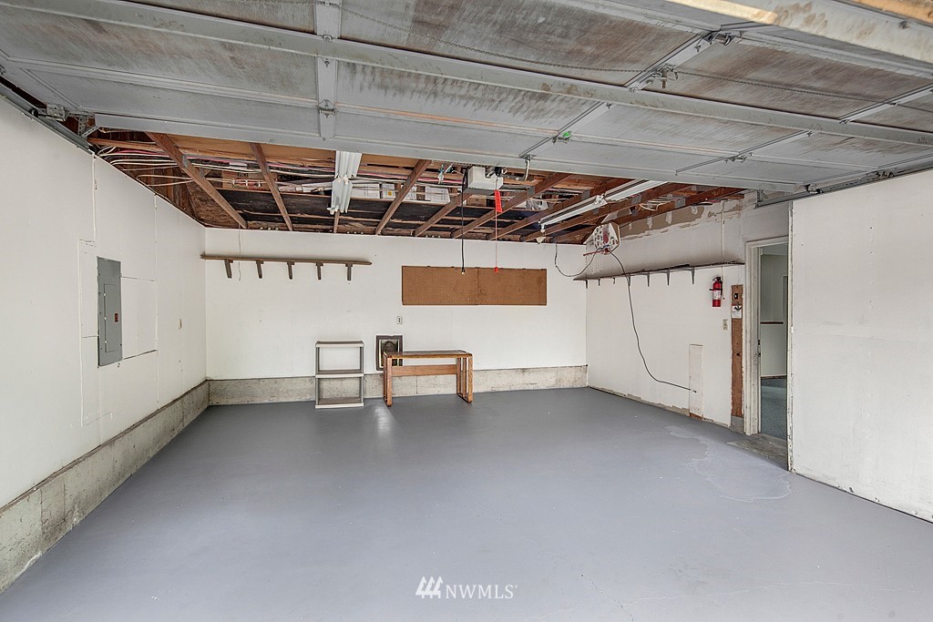 623 Harvest Road Bothell, WA 98012 - Photo 9 of 11 a view of a room with wooden walls