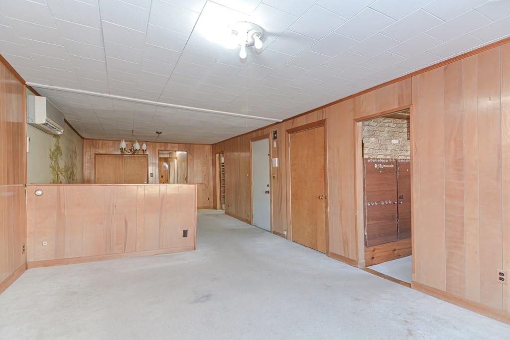 291 Sumner Street Boston, MA 02128 - Photo 14 of 41 a view of a room with wooden walls