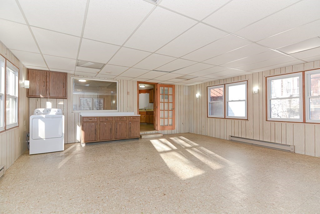 291 Sumner Street Boston, MA 02128 - Photo 17 of 41 a view of an empty room with a window