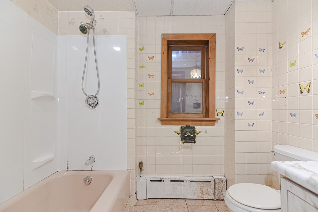 291 Sumner Street Boston, MA 02128 - Photo 22 of 41 a bathroom with a shower a toilet and a shower