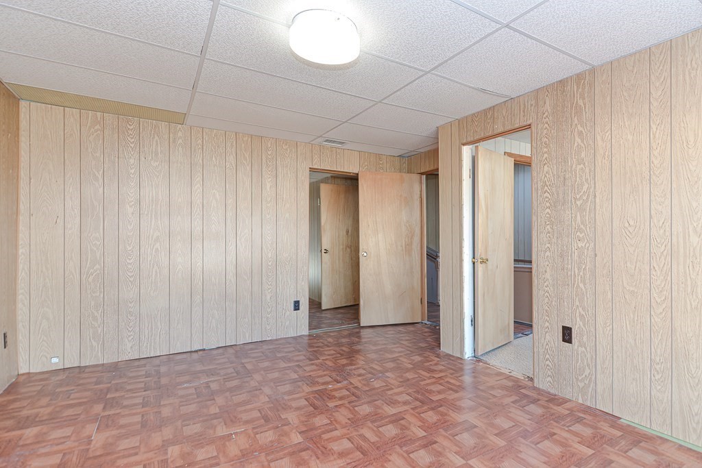 291 Sumner Street Boston, MA 02128 - Photo 30 of 41 a view of an empty room and a window
