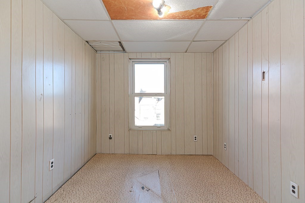 291 Sumner Street Boston, MA 02128 - Photo 32 of 41 a view of an empty room and window