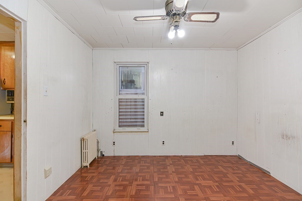 291 Sumner Street Boston, MA 02128 - Photo 34 of 41 a view of an empty room with a window