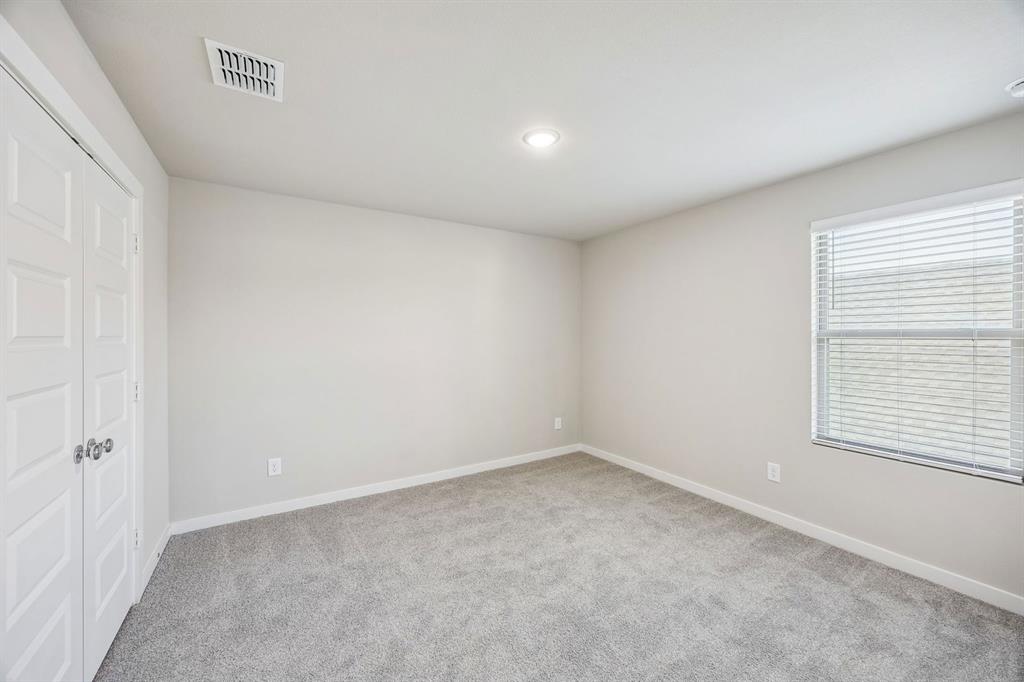 324 Millwood Road Lavon, TX 75166 - Photo 26 of 33 Bedroom in the Willow home plan by Trophy Signature Homes – REPRESENTATIVE PHOTO