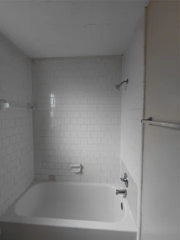 a close view of a bathtub in bathroom