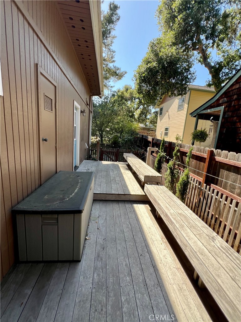 1530 Emerson Road Cambria, CA 93428 - Photo 45 of 54 East side of house with deck and seating