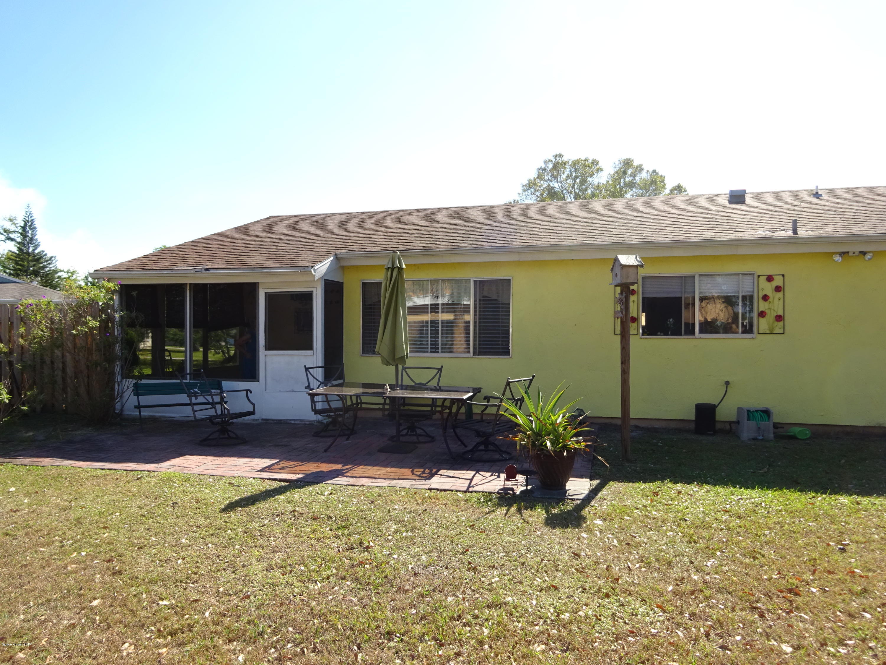 1349 Freil Road Northeast Palm Bay, FL 32905 - Photo 14 of 22 Screened Porch and Patio