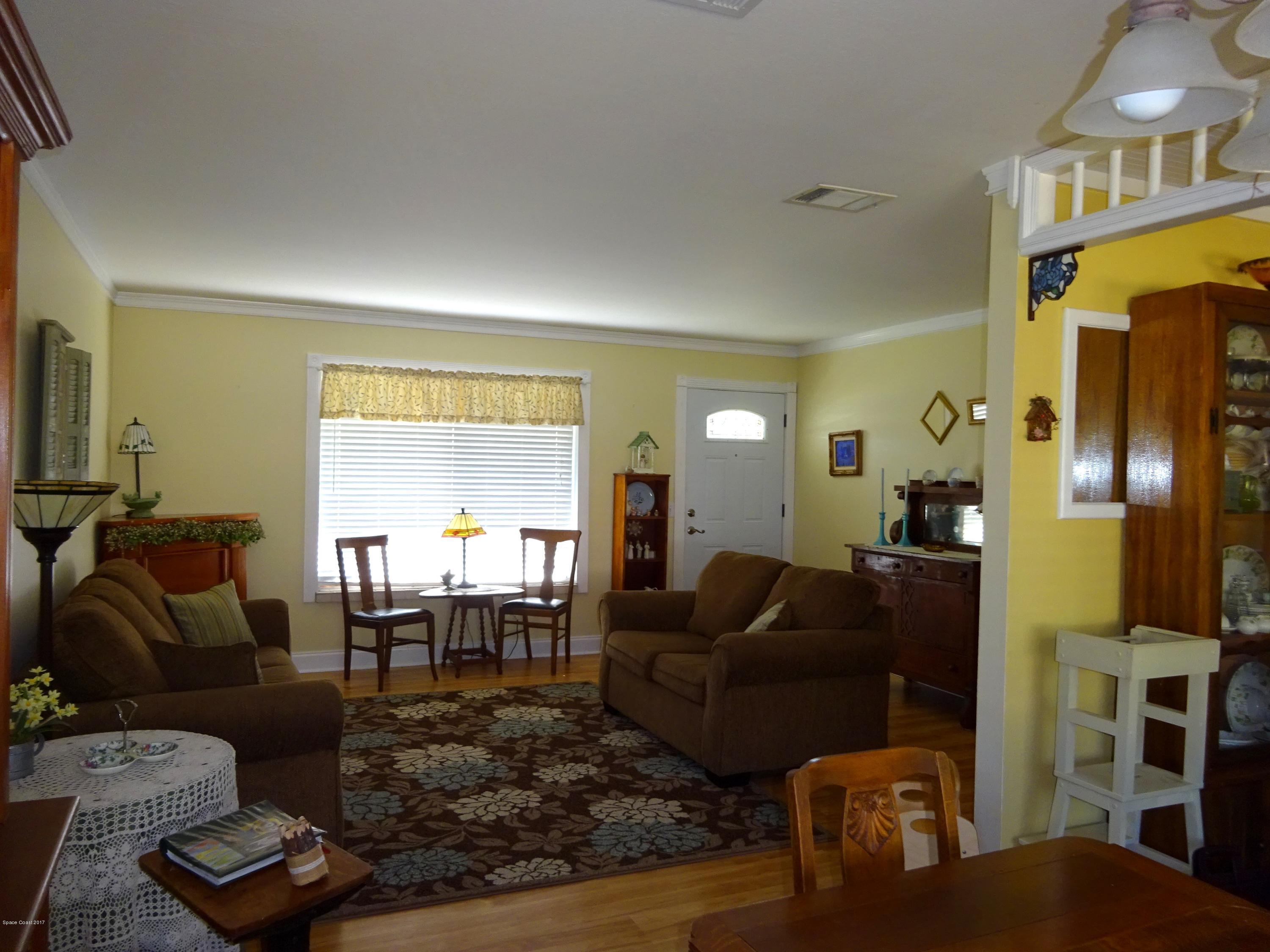 1349 Freil Road Northeast Palm Bay, FL 32905 - Photo 9 of 22 Dining to Family Room