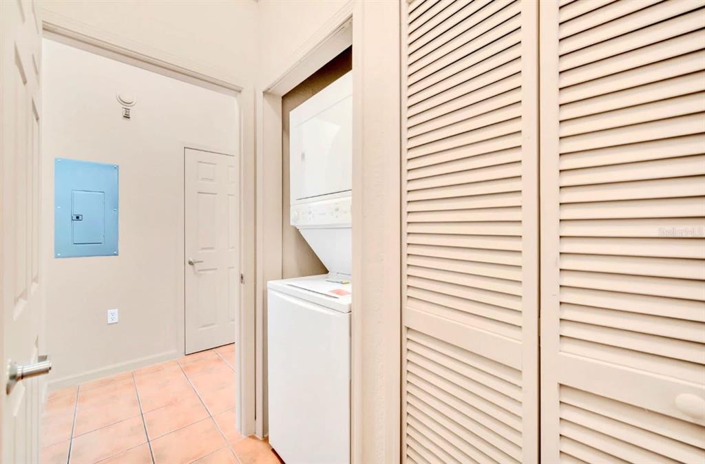 14200 Avalon Road, Unit 426 Winter Garden, FL 34787 - Photo 17 of 44 a view of a kitchen from a hallway