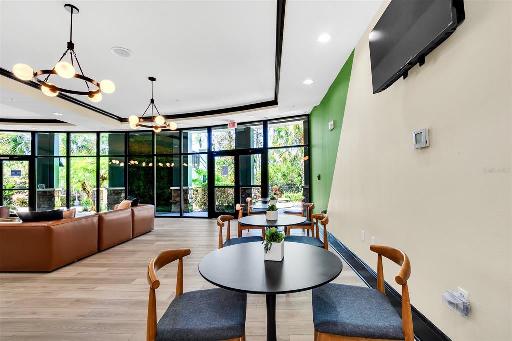 14200 Avalon Road, Unit 426 Winter Garden, FL 34787 - Photo 29 of 44 a living room with furniture and a window