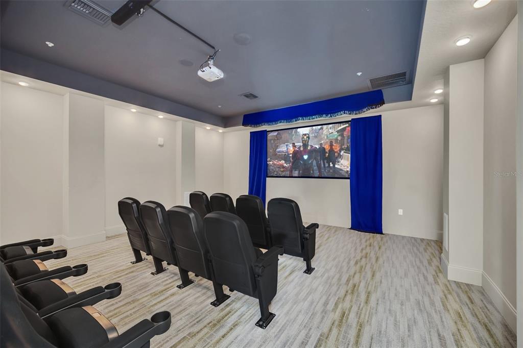 14200 Avalon Road, Unit 426 Winter Garden, FL 34787 - Photo 31 of 44 a living room with furniture and a flat screen tv