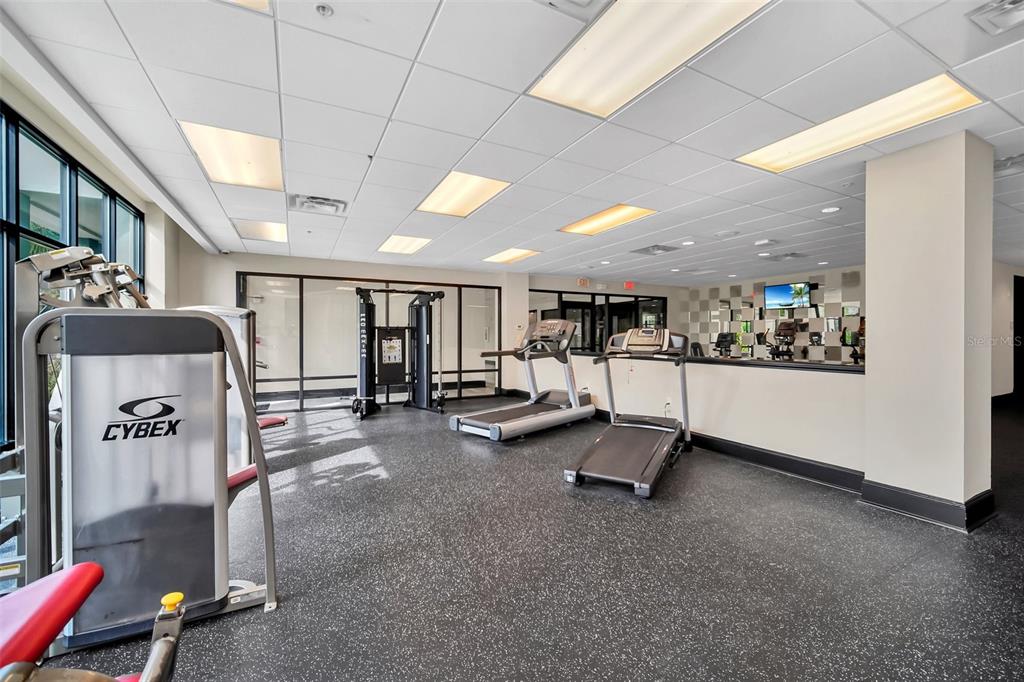 14200 Avalon Road, Unit 426 Winter Garden, FL 34787 - Photo 34 of 44 a view of a gym room with gym equipment