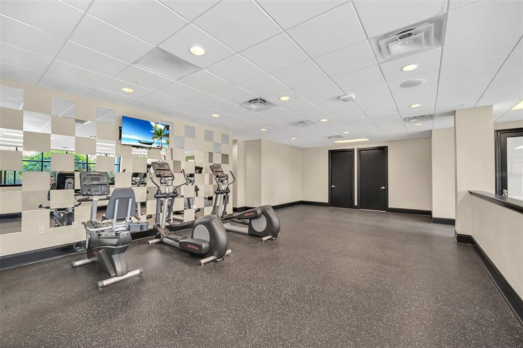 14200 Avalon Road, Unit 426 Winter Garden, FL 34787 - Photo 35 of 44 a view of a room with gym equipment