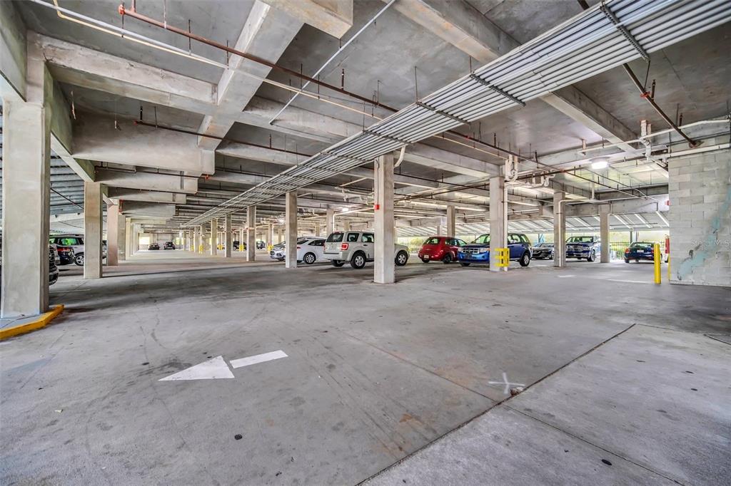 14200 Avalon Road, Unit 426 Winter Garden, FL 34787 - Photo 41 of 44 a view of parking garage with shelves