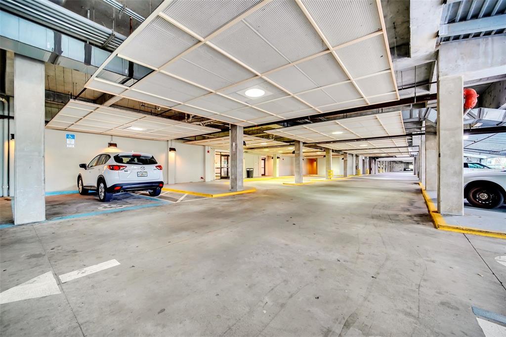 14200 Avalon Road, Unit 426 Winter Garden, FL 34787 - Photo 42 of 44 a car parked in front of a building