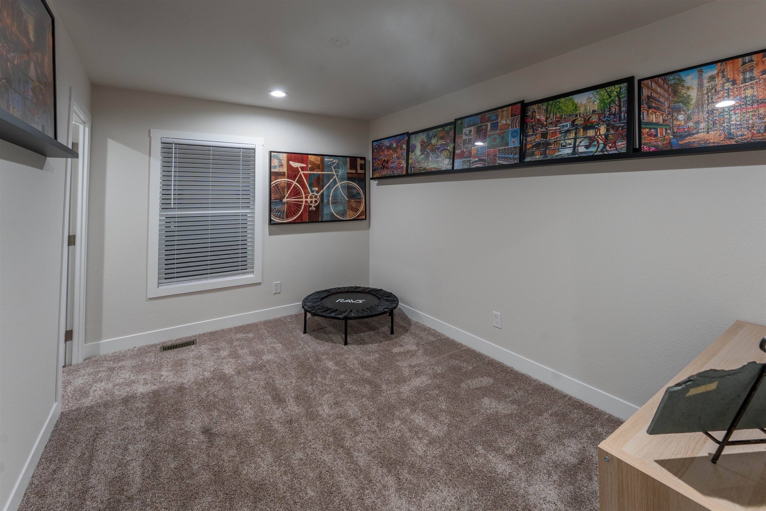 264 Holly Berry Way Fruita, CO 81521 - Photo 14 of 27 a room with workbench and window