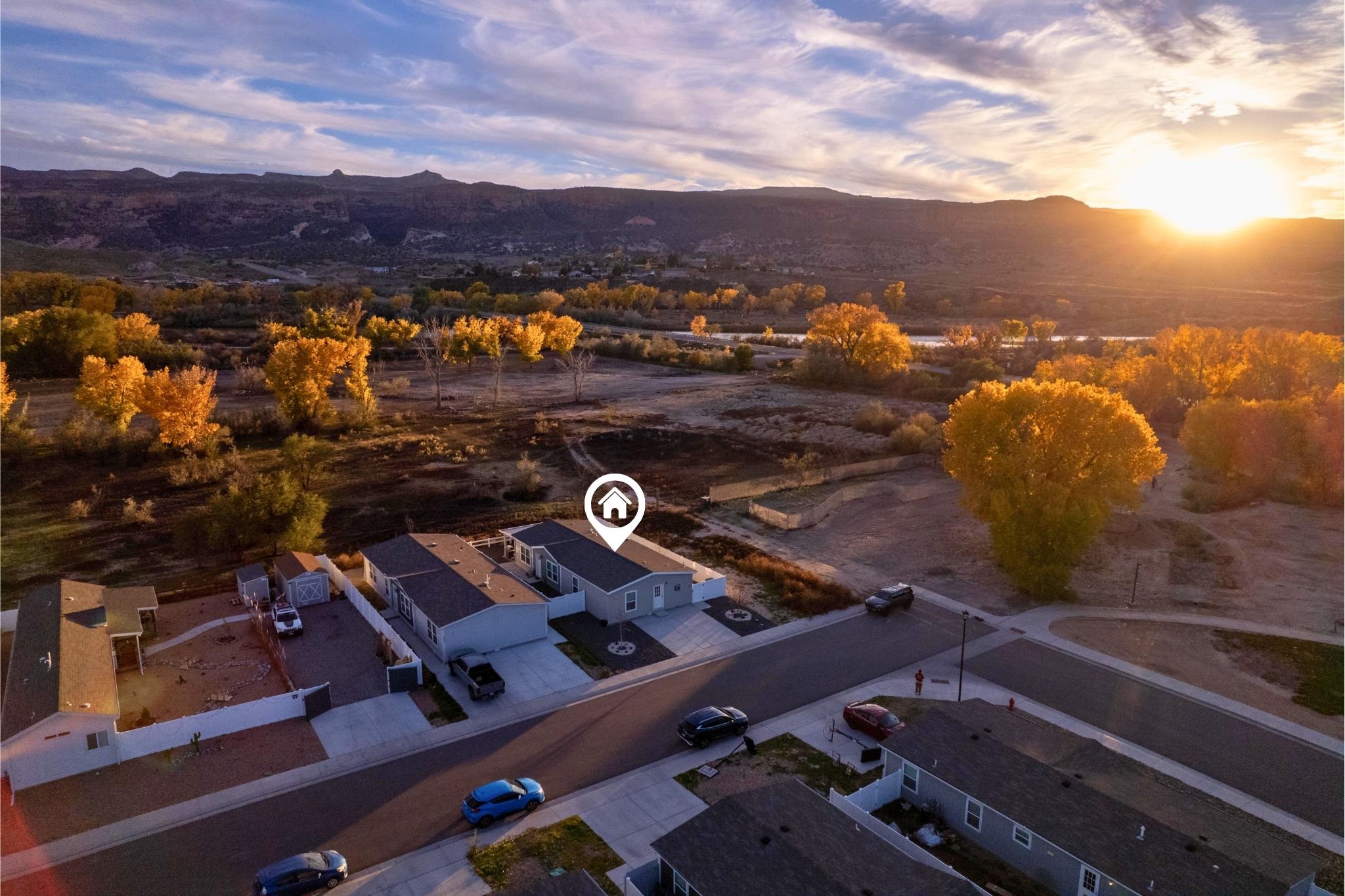 264 Holly Berry Way Fruita, CO 81521 - Photo 24 of 27 an aerial view of residential houses with outdoor space