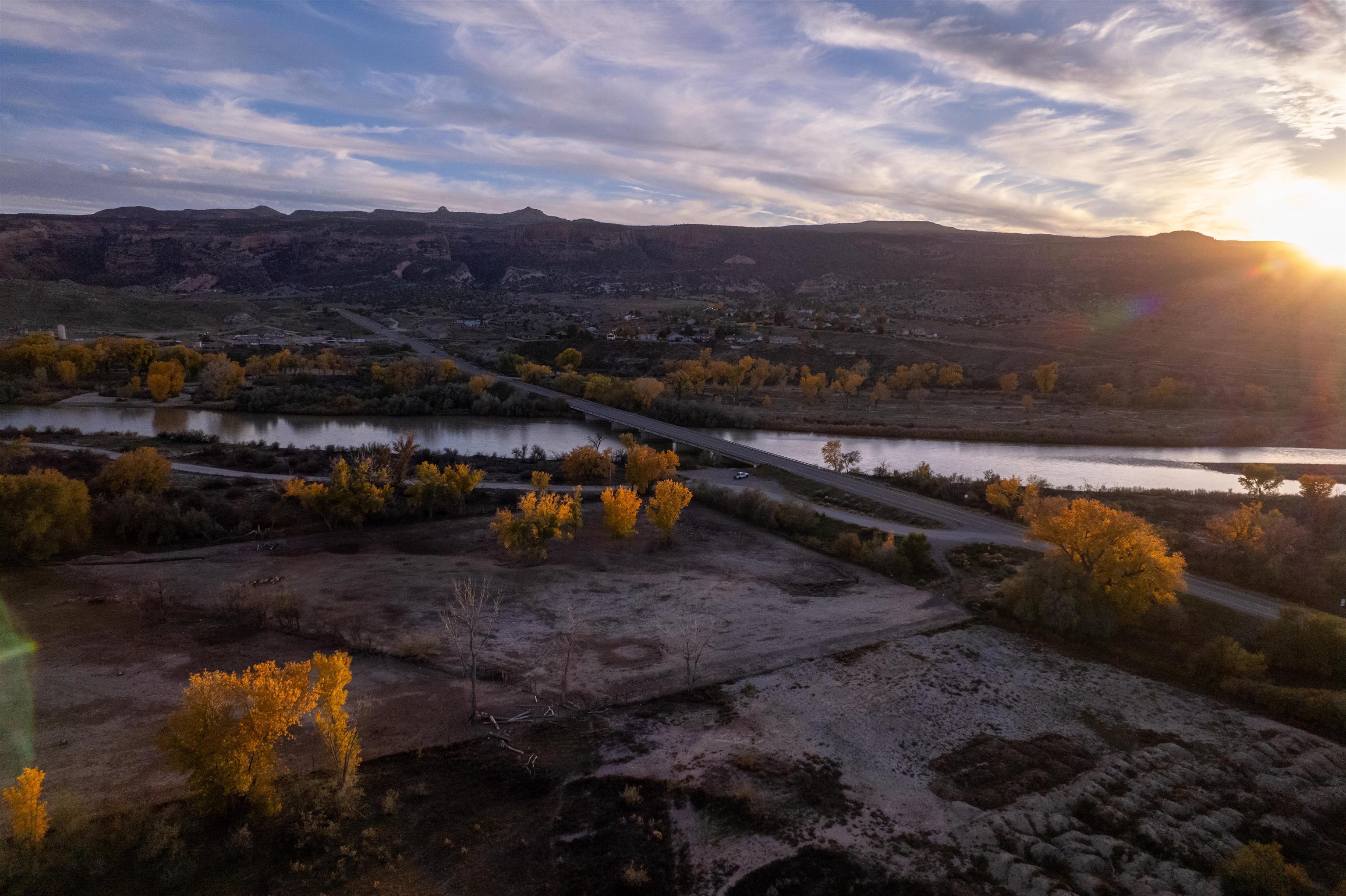 264 Holly Berry Way Fruita, CO 81521 - Photo 25 of 27 a view of a lake with a mountain