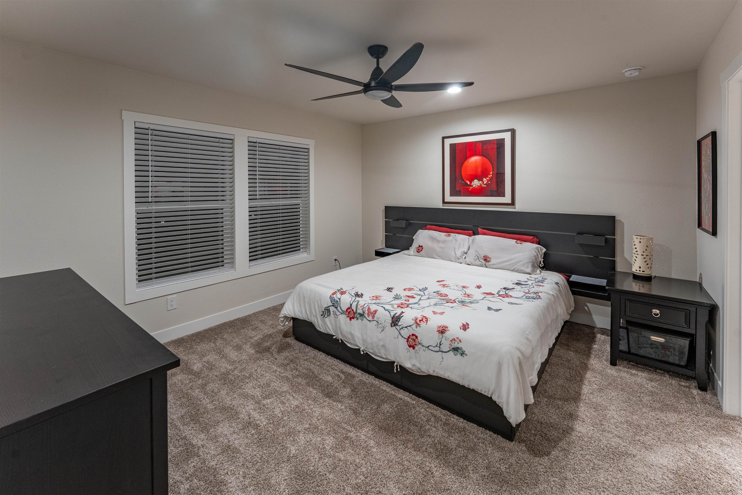 264 Holly Berry Way Fruita, CO 81521 - Photo 10 of 27 a bedroom with a bed and a window