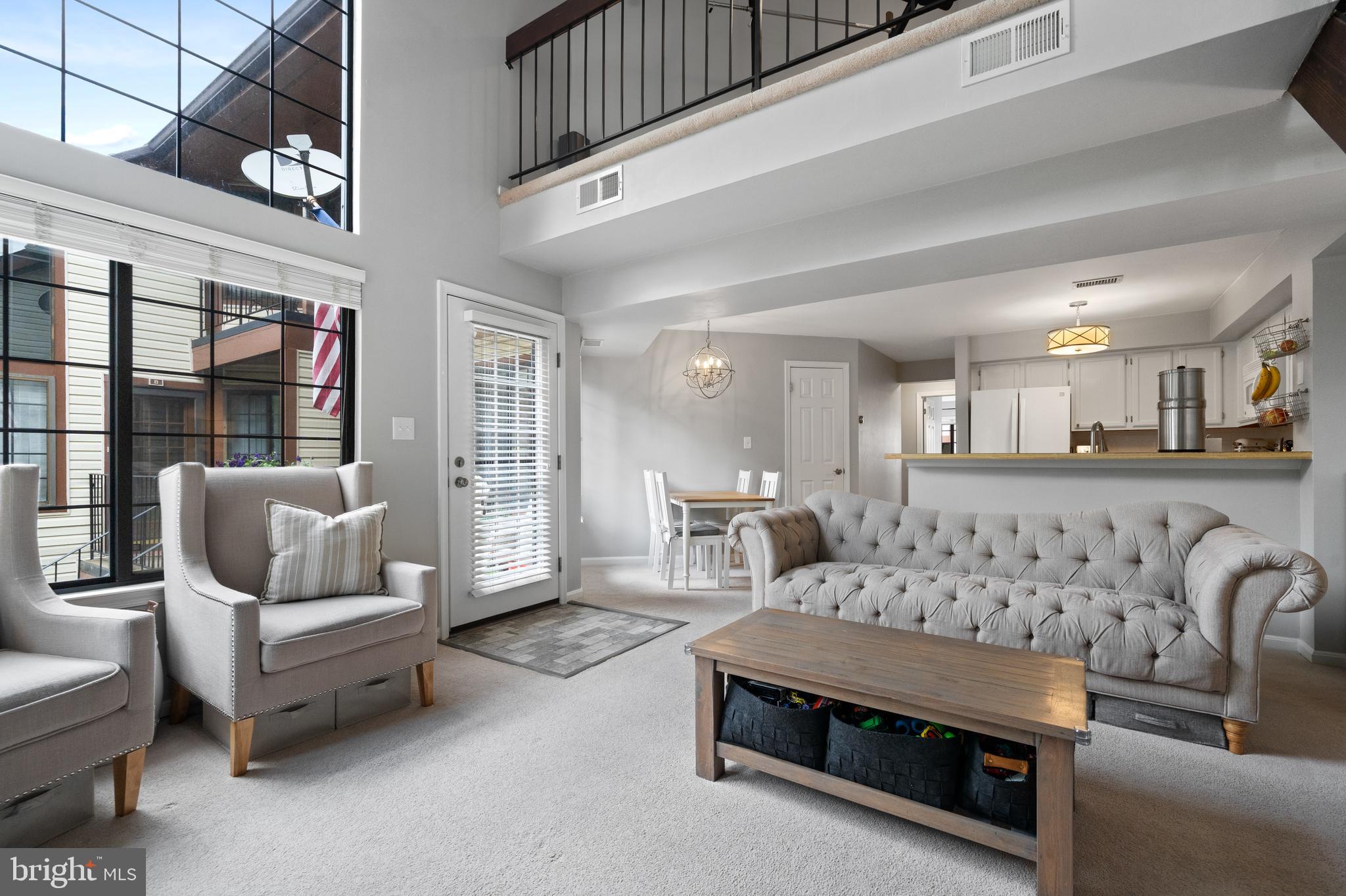 6022 Curtier Drive, Unit E Alexandria, VA 22310 - Photo 12 of 38 a living room with furniture