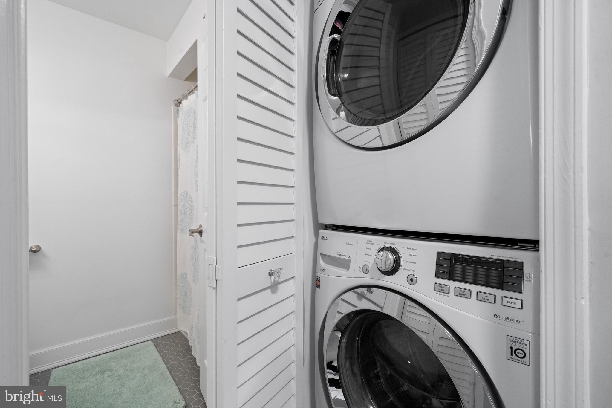 6022 Curtier Drive, Unit E Alexandria, VA 22310 - Photo 17 of 38 a utility room with dryer and washer
