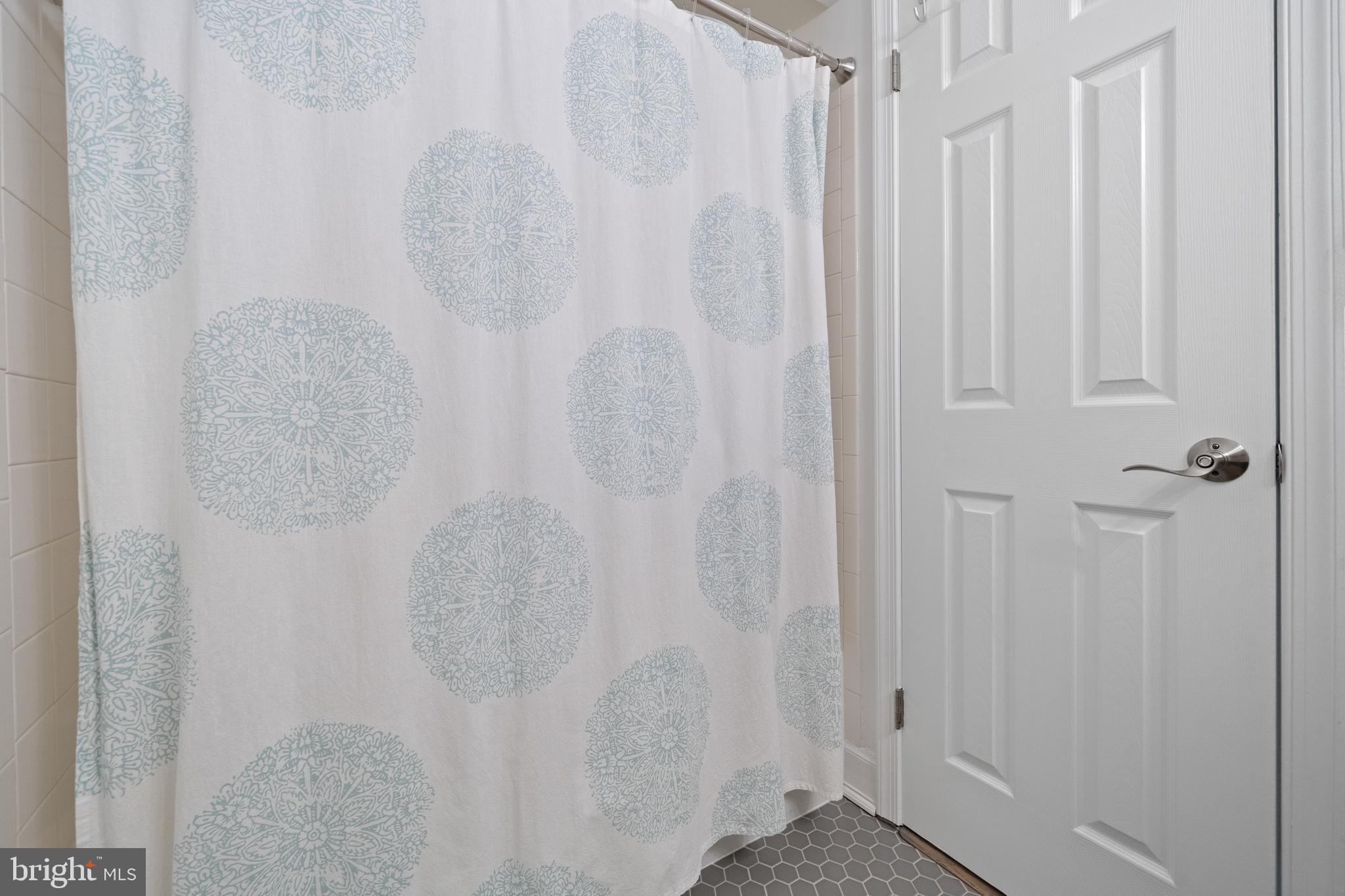 6022 Curtier Drive, Unit E Alexandria, VA 22310 - Photo 19 of 38 a view of a small bathroom