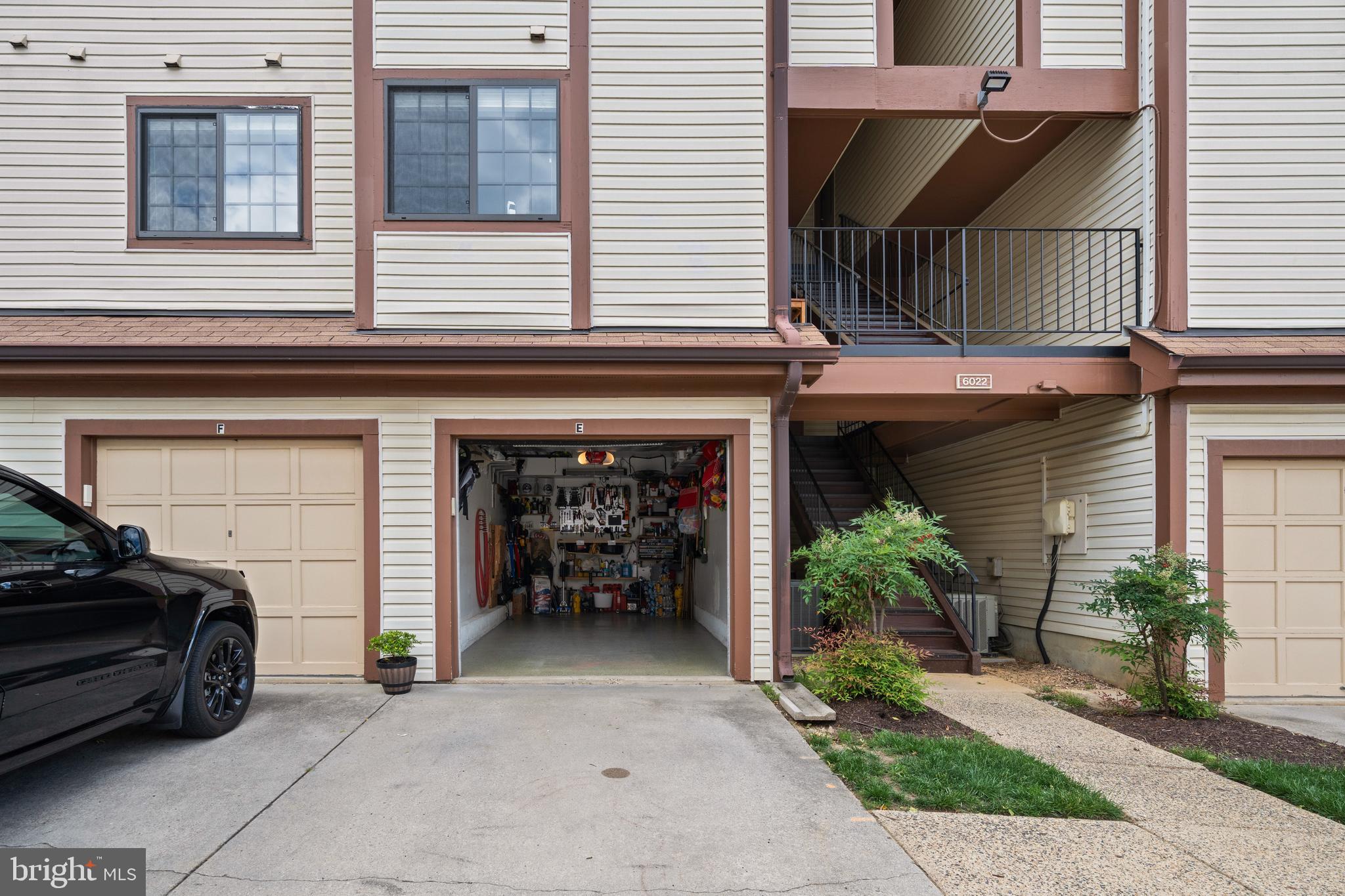 6022 Curtier Drive, Unit E Alexandria, VA 22310 - Photo 38 of 38 a house view with a outdoor space