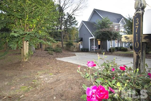 3710 Old Lassiter Mill Road Raleigh, NC 27609 - Photo 3 of 25 a front view of house with small yard